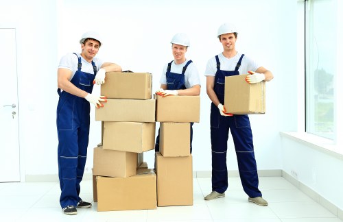 Removal crew handling furniture during a Kentish Town commercial relocation
