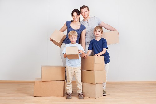 Local mover carrying items in a Kentish Town flat