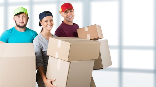 Professional removal team handling boxes during a Kentish Town move