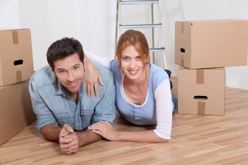 Sofa and bedroom furniture ready for removal in a Kentish Town flat