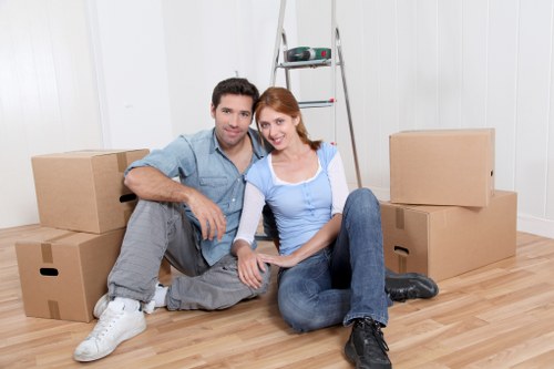Boxes and office equipment organised for a commercial move near Kentish Town