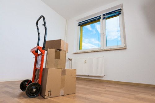 Furniture and boxes being handled during a local removal
