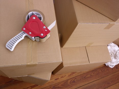 Loading furniture into a removal truck in a residential street