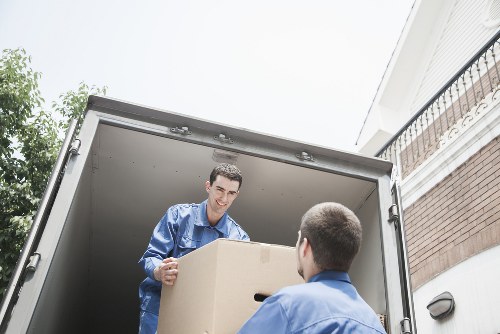 Packed boxes and furniture ready for house removals